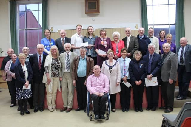 Outgoing Mayor of Louth, Eileen Ballard, alongside those who benefitted from her cheques at the Annual Town Meeting on Tuesday May 9.