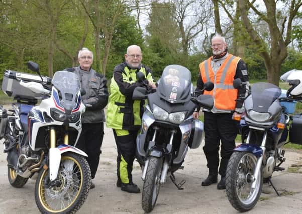 Three motorcycling friends are off to Europe's most northerly point, Nord Kapp in Norway. From left, Michael Dawson, Mike Cowling and Sherwood Barker Grimshaw. pic mike cowling may 3 2017 EMN-170518-120549001