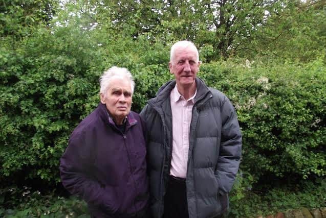 Hand over: Outgoing coordinator David Platt (left) with his successor Stewart Attwood. Photo: Bob Wayne