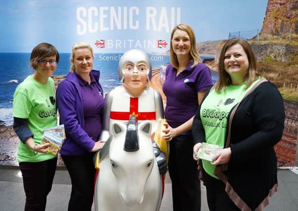 From left, Jools Townsend (ACoRP), Hayley Blood (Lincolnshire County Council), Kay Robinson (Poacher Line Community Rail Partnership) and Alice Mannion (ACoRP), are joined by one of the Lincoln knights for the launch of the Scenic Rail Britain Campaign.
