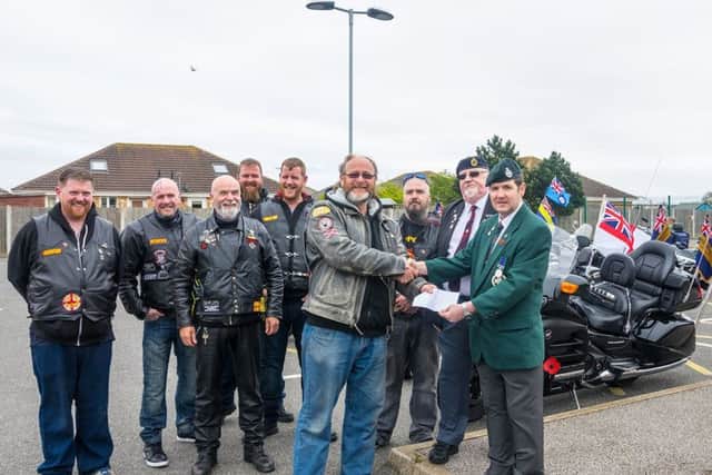 The Broken Chain Brotherhood club pictured presenting money to Mark Reddin from the British Legion