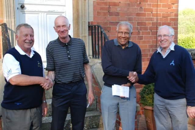 Fron left, Seniors captain Malcolm Bood with Invitation Day winners John Hood and Sam Roy, and competition organiser David Pritchard. EMN-170515-171515002