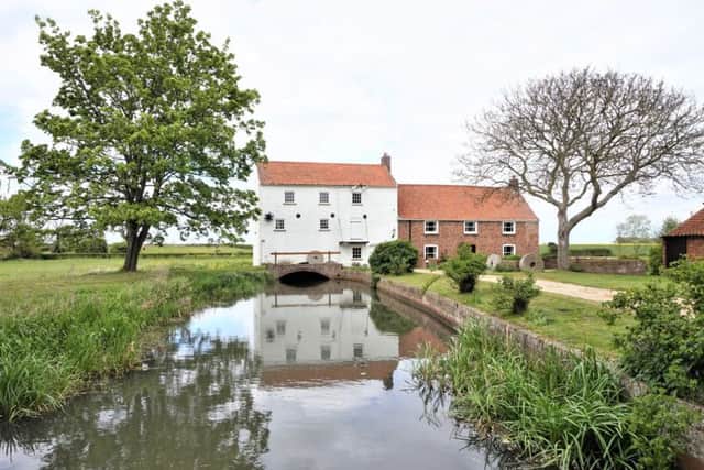 This beautiful house with watermill is on the market for £620,000.
