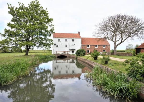 This beautiful house with watermill is on the market for Â£620,000.