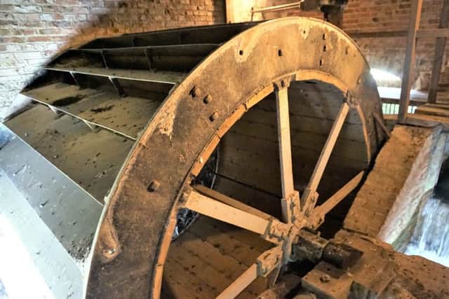 The property includes a fully working three-floor watermill.