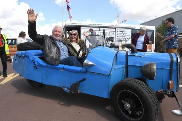 County Linx fundraising day outside Skegness Lifeboat Station, raising money after break-in at RNLI shop. Alan Watkinson taking people for a ride in his handmade Morgan car. Pictured with Lynne Sollis of Skegness. Photo: MSKP-140517-25 ANL-170515-171813001