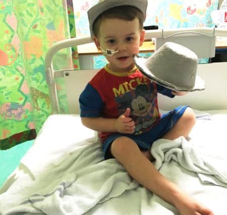 Teddie recovering in hospital during his treatment.