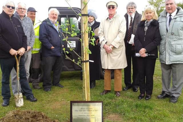 A tree planted and plaque installed in memory of Coun Alun Israel in Heckington. EMN-170516-114500001