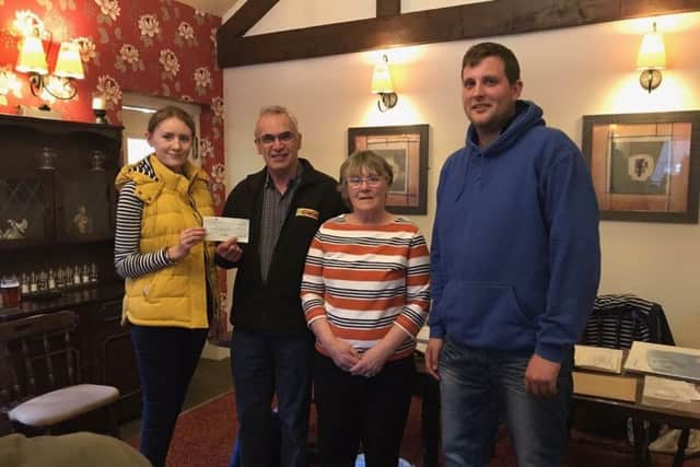 The Lincolnshire and Nottinghamshire Air Ambulance recently received a cheque from the Louth Young Farmers Club.
