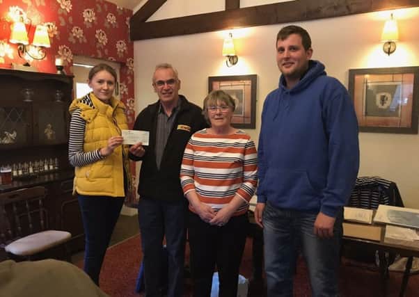 The Lincolnshire and Nottinghamshire Air Ambulance recently received a cheque from the Louth Young Farmers Club.