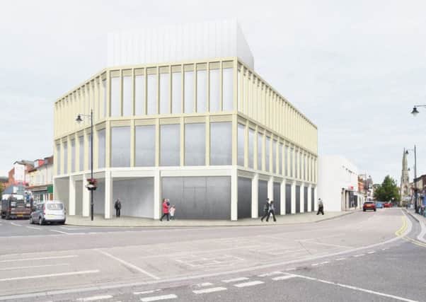 The design for the new shops and office building for the corner of Station Road and Southgate in Sleaford. EMN-170517-100648001