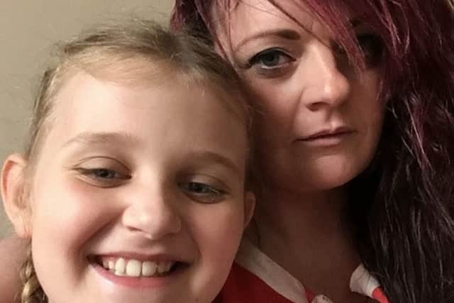 Scarlett Hinchliffe and her mum Jodi. Photo: SWNSIncredibly, a small spider then burst out of her leg while she was having a bath at her nan's house. EMN-170517-112847001