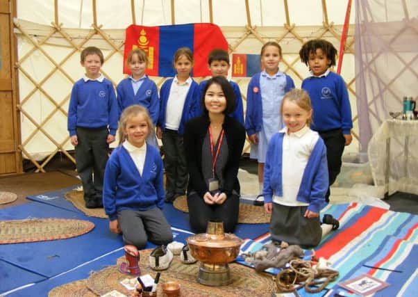 Kherlen Bolorchuluun, a student from De Montfort University in Leicester, led groups making Mongolian dumplings and other traditional activities at Leadenham School as part of their week learning about the culture of the country. EMN-170522-175450001