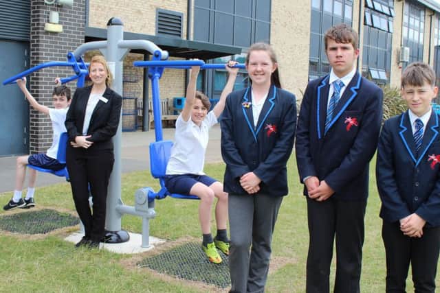 St George's Academy Vice-Principal and and Head of Ruskington Campus, Claire Adams with students and the new gym equipment. EMN-170519-112506001