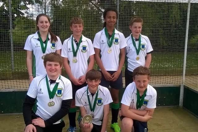 Louth Hockey Club Under 14s proudly wear their runners-up medals EMN-170518-151847002
