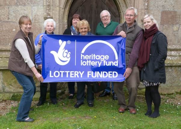 Members of the PCC of St Clements and Grainthorpe Heritage Group celebrating the success of the award of funding with Charlotte Mulliner, East Midlands HLF Officer.