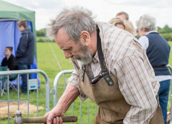 Stan Hampson Blacksmith from 'Old Mill Crafts' Billinghay EMN-170522-064858001
