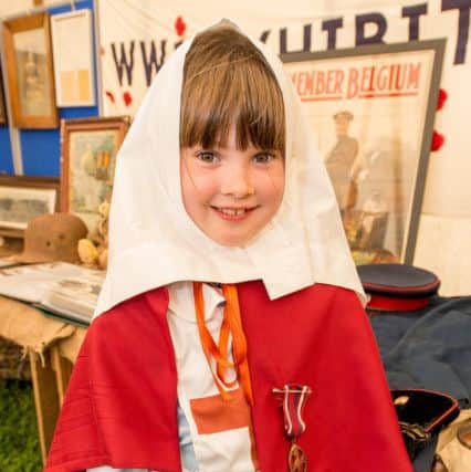 Olivia Midgley age 7 part of wolrd war one display EMN-170522-063514001