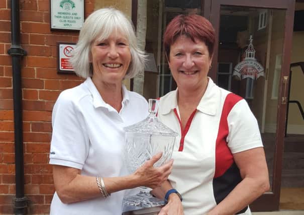 Trophy winner Anne Gardiner (left) with lady captain Andrea Smaggasgale EMN-170523-095834002