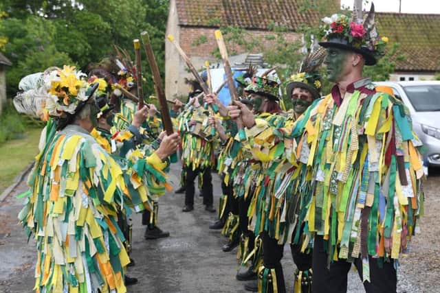 Morris Dancing in action from the Bourne Borderers. EMN-170522-103822001