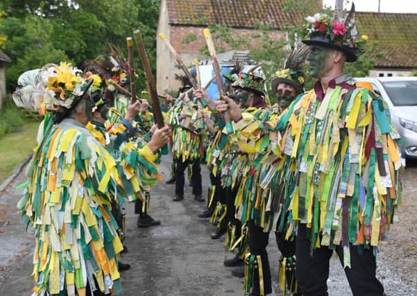 Morris Dancing in action from the Bourne Borderers. EMN-170522-103822001