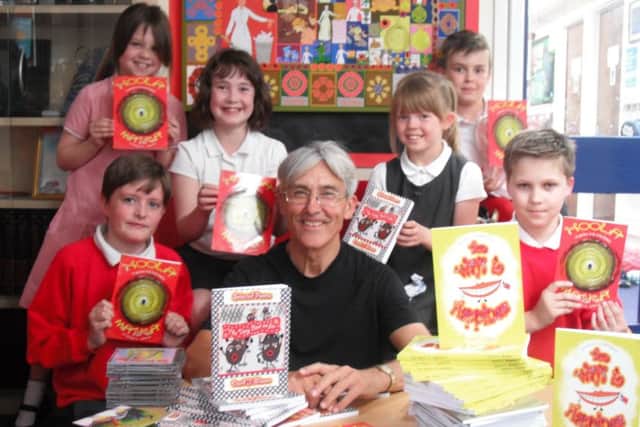 Pupils with author David Mason. EMN-170524-172205001