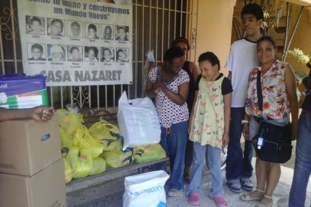 HIWC member Anna Rodriguez at the orphanage in Puerto Plata EMN-170531-164658001