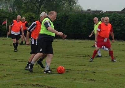 Action from Caistor Walking Football's inaugural match EMN-170525-120529002