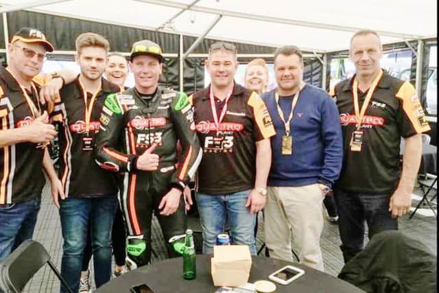 Chris Fairburn (middle) with the FS-3 racing team.
