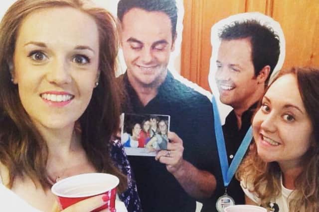 Rebecca Grice (right) with best friend Katie Holmes and Rebecca's cardboard cut-outs of Ant and Dec.