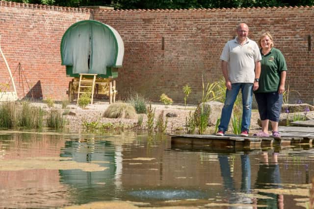 The natural swimming pool lends a sense of tranquility to the garden EMN-170527-170511001
