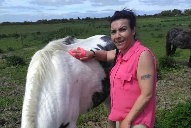 Sacha Evans, of Skegness, with her horse.