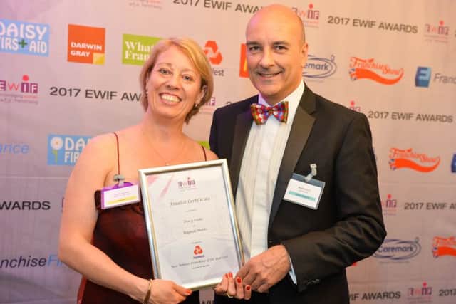 Tracy Cooke with award sponsor Mark Scott, of Natwest.
