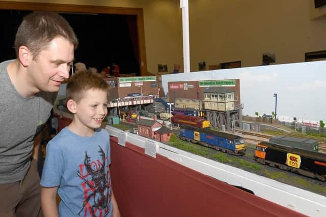 Second Sleaford and District model railway club exhibition. Jon Starbuck with Noah Starbuck 10 of Sleaford. EMN-170506-114405001