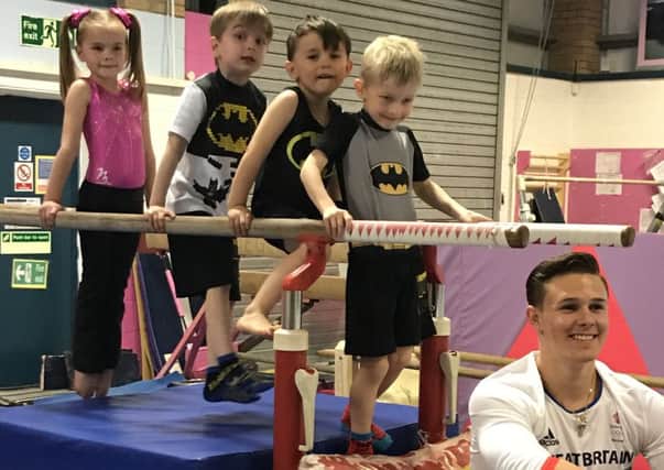 British Olympian Brinn Bevan and children at Sleaford Elite Gymnastics Club EMN-170529-153945002