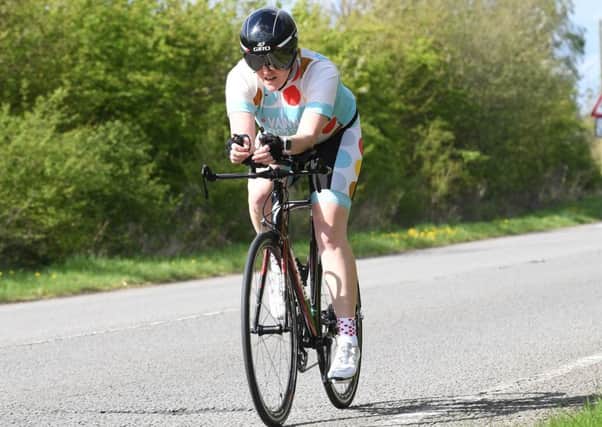 June Jackson takes on the A15 course during the Sleaford Wheelers Cycling Club Charity TT earlier this year EMN-170529-161737002