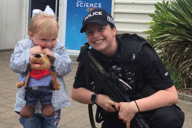 Time for a photo. Armed officers drafted on Thursday as part of Operation Temperer to support Lincolnshire Police posed for pictures with the public. ANL-170530-103458001