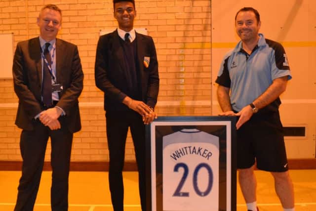 Morgan with headteacher Mark Guest (left) and head of PE Kerry Symmons EMN-170530-105725002