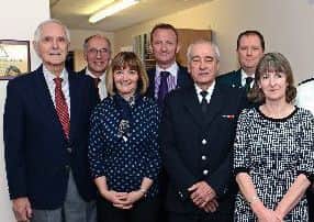 Ken Bush (left) with guests and officials at a LIVES function in 2012. Photo: John Aron EMN-171206-133208001