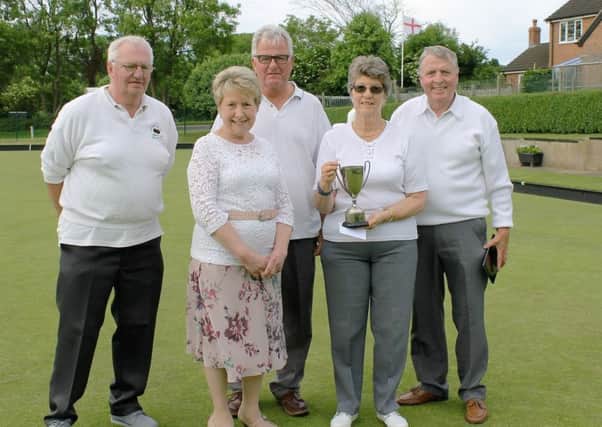 The winning team, from left, Bill Overy, sponsor Mary Reeve, Peter Marriott, Sandra Wood, club chairman David Wright Picture: Wes Allison EMN-170506-115539002