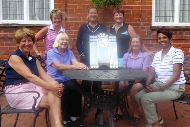 Dorothy Marshall Shield winners, from left, front - Jo Herring, Sue Letby, Bridget Hardaway, Noreen Bradford; back - Lincolnshire ladies county captain Birdie Dawson, ladies county chairman Tracey Stobart and Kenwick's lady captain Andrea Smaggasgale EMN-170206-130615002