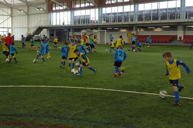 Caythorpe and Fulbeck pupils enjoy a training session at St George's Park EMN-170206-164118002