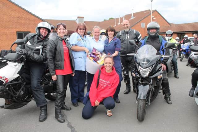Fighting 4 Life Lincolnshire campaigners and bikers showed their gratitude to front-line hospital staff by presenting them with biscuits.