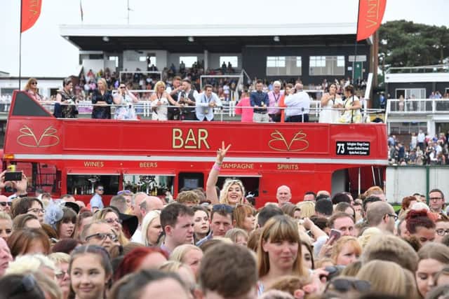 Crowds flocked to the stage to get the best spot. Photo: Dave Dawson