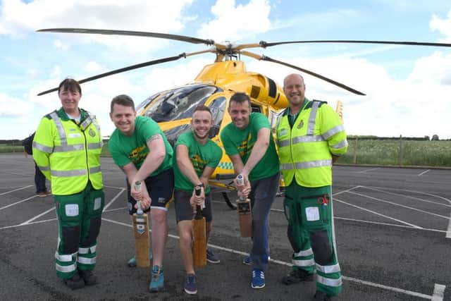 Shaun Brown, Richard Wells and Dave Newman who are going to attempt to break the record for longest indoor cricket net, raising money for Air Ambulance. L-R Jane Pattison - paramedic, Shaun, Richard, Dave, Neil Clarke - paramedic and ops manager. EMN-170506-122643001