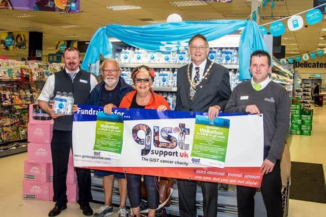 Pictured is Co-op manager Kevin Fergerson, Don and Issie Barrett, deputy mayor Stephen Palmer and Paul Marson of Magna Vitae.