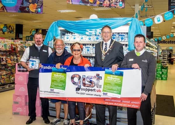 Pictured is Co-op manager Kevin Fergerson, Don and Issie Barrett, deputy mayor Stephen Palmer and  Paul Marson of Magna Vitae.