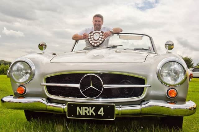 Neil Thompson of Woldside Classic and Sports Car in Louth won the Car of the Show with his Mercedes Roadster.