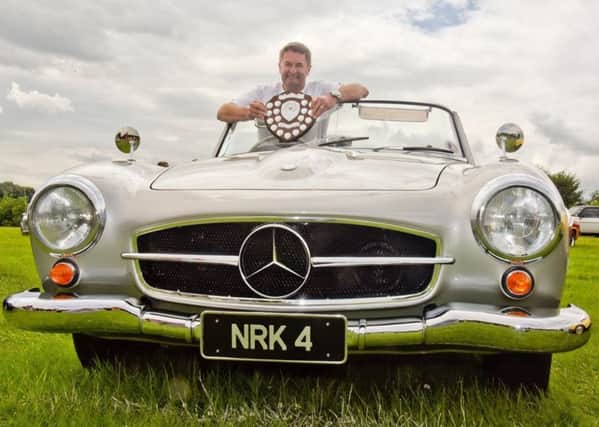Neil Thompson of Woldside Classic and Sports Car in Louth won the Car of the Show with his Mercedes Roadster.