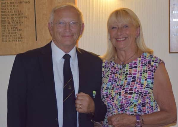 Club President David Smith, the winner of the Past Captains Gala Day, with Lady Captain Gloria Bursnell.